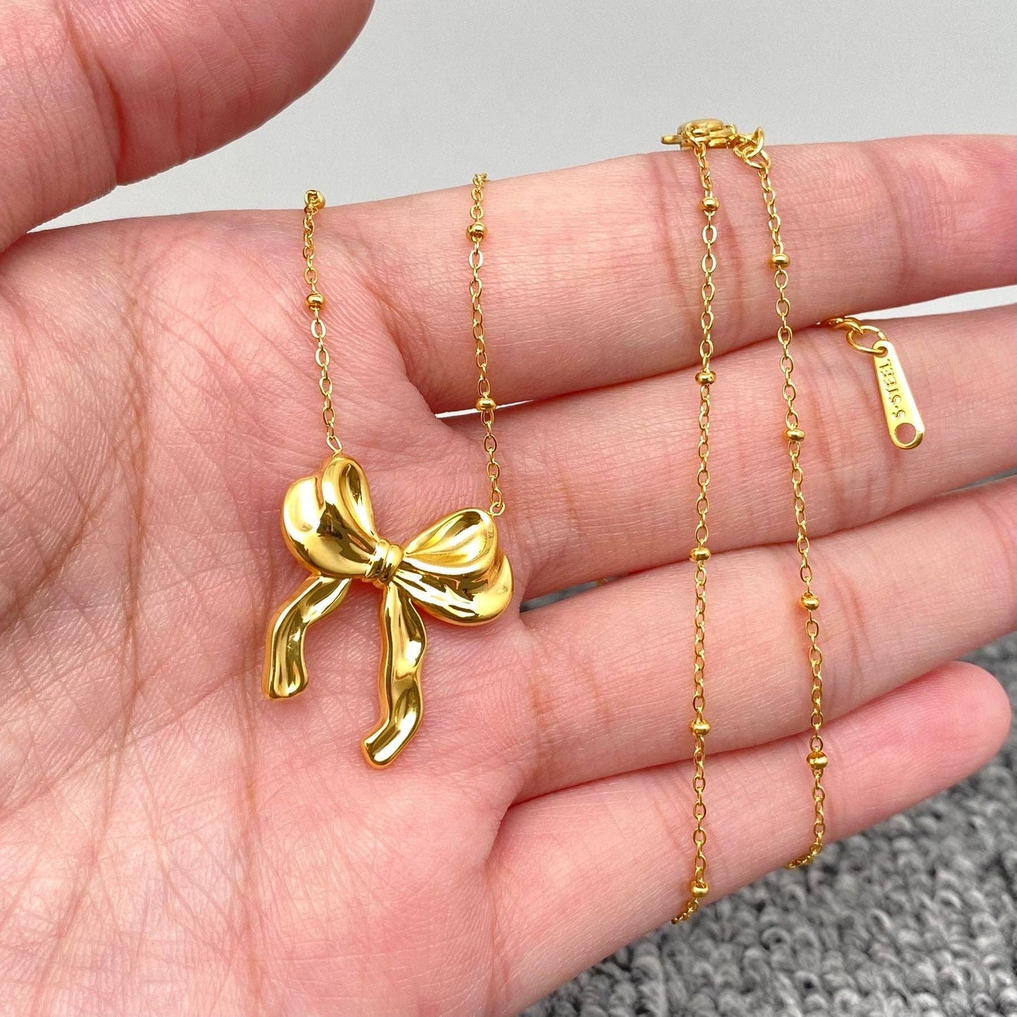 18k Golden Bow Pendant Necklace